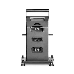 May include: A black vertical industrial machine with a top handle, featuring three rectangular recessed ports on the front face, each containing a circular lens surrounded by small LED lights, mounted on a base with four adjustable circular feet.