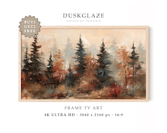 Op de afbeelding: Een rechthoekig digitaal olieverfschilderij van een boslandschap in een lichthouten lijst. Het kunstwerk toont donkergroene dennenbomen en oranje gebladerte in een mistige omgeving. Tekst: DUSKGLAZE, BUY 1 GET 2 FREE, FRAME TV ART, 4K ULTRA HD, 3840 x 2160 px, 16:9.