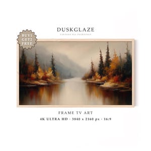 May include: A landscape oil painting in a light wood frame depicting a river flowing through a forest with autumn-colored trees in shades of orange, red, and dark green. Text includes DUSKGLAZE, BUY 1 GET 2 FREE, FRAME TV ART, 4K ULTRA HD, 3840 x 2160 px, 16:9.