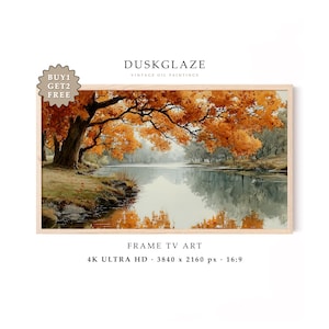 Può includere: Un dipinto paesaggistico digitale rettangolare in una cornice di legno chiaro che mostra un grande albero con foglie autunnali arancioni vibranti sopra un fiume calmo. Il testo DUSKGLAZE VINTAGE OIL PAINTINGS, FRAME TV ART, 4K ULTRA HD, 3840 x 2160 px, 16:9 è visibile.
