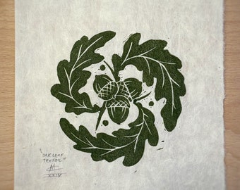 Eikenblad en eikel klaverblad linoprint