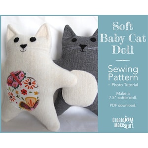 a soft, plump cat doll made with fleece and has a fabric patch on its tummy. sewing pattern to make a little cat softie