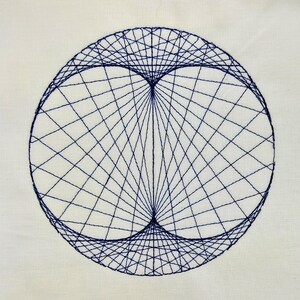 May include: A circular embroidery design featuring dark blue thread stitched onto a light cream fabric. The pattern consists of intersecting straight lines that form a complex geometric shape with two curved focal points inside the circle.
