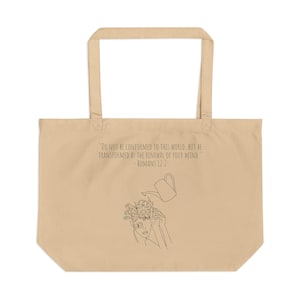 May include: A tan tote bag featuring a black line art illustration of a person with flowers growing from their head being watered by a watering can. The text reads: "DO NOT BE CONFORMED TO THIS WORLD. BUT BE TRANSFORMED BY THE RENEWAL OF YOUR MIND." - ROMANS 12:2.
