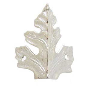 May include: A silver-toned metal corner protector shaped like an ornate leaf. The decorative piece features a polished, reflective surface with intricate embossed veins and two small circular holes on the sides for mounting with screws or nails.