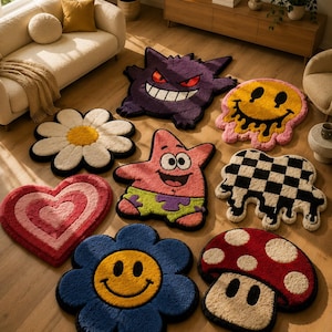 May include: A collection of eight tufted area rugs featuring diverse shapes including a purple Gengar, a pink Patrick Star, a red mushroom, a daisy, a heart, a melting smiley face, a blue smiley flower, and a black and white checkered pattern.