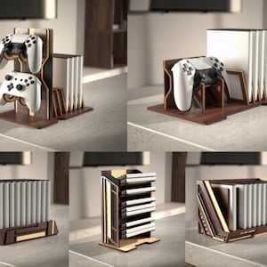 May include: A dark brown and light wood gaming console and controller storage organiser. The unit features slots for holding multiple game cases vertically and dedicated mounts for two white wireless controllers, showcasing a modular design.