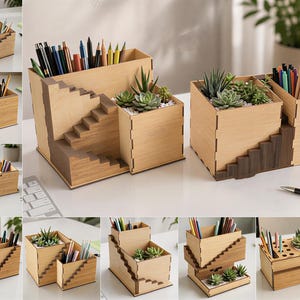 May include: A light-colored wooden desk organizer featuring a tiered staircase design, multiple compartments for pens and pencils, and a dedicated square section filled with small white stones and green succulent plants.