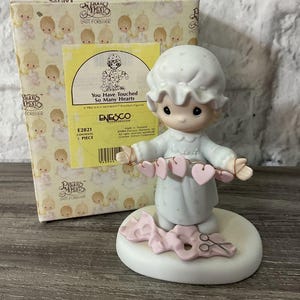 Precious Moments ENESCO 1983 Figurine &quot;You have Touched So Many Hearts&quot;