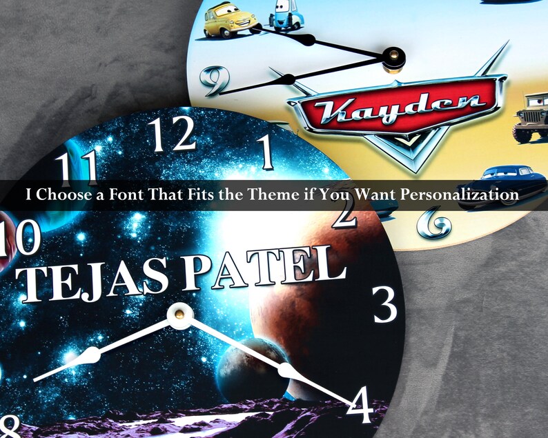 a clock with a space-themed design, including a planet and stars. The clock also has a personalized name on it.