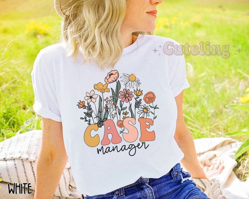 May include: White t-shirt with a floral design and the text "CASE manager" in colorful letters.