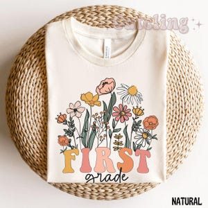 First Grade Teacher Shirt, Wildflowers 1st Grade Teacher Shirt Back to School Teacher Crew T-Shirt First Grade Teacher Appreciation Gift