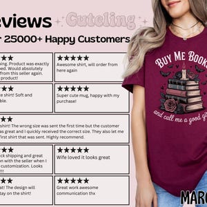 May include: Maroon t-shirt with the text "BUY ME BOOKS and call me a good girl." The shirt features a graphic of stacked books, roses, and butterflies. The shirt is a casual style.