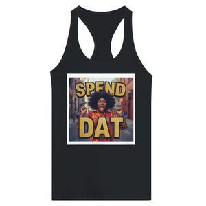 May include: A black racerback tank top featuring a square graphic print on the chest. The graphic displays a person with dark curly hair sticking their tongue out, overlaid with the gold-colored text SPEND DAT in a bold, sans-serif font.