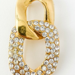Vintage YSL Brooch: Gold Infinity Pin with Crystal Rhinestones
