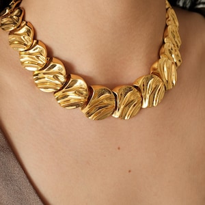 Vintage Monet goudkleurige chokerketting: gesigneerde designersieraden