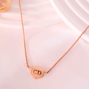 Vintage Christian Dior Choker: Gold CD Logo Necklace