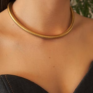 ヴィンテージ YSL ネックレス：イヴ・サンローランのゴールドハンマー