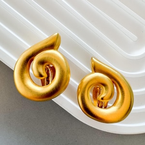 Orecchini a clip vintage Givenchy: design a spirale dorata