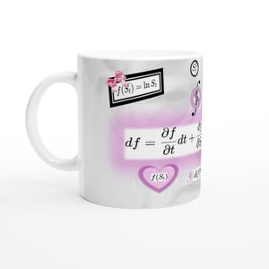May include: White ceramic mug featuring mathematical formulas and equations in black and pink. The mug includes the equation f(St) = ln St, and other calculus symbols. A pink heart shape is also visible on the mug.