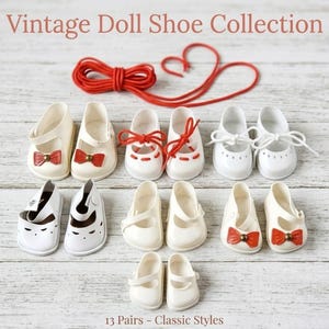 May include: A collection of thirteen pairs of white doll shoes in various styles, including Mary Janes with red bows, lace-up shoes with red laces, and plain white slip-ons. The text "Vintage Doll Shoe Collection" and "13 Pairs - Classic Styles" is visible.