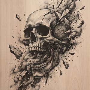 May include: A black and white illustration printed on a light wood grain surface depicting a human skull shattering into fragments. The skull is shown with an open jaw, surrounded by floating shards and dark, stippled smoke-like clouds.