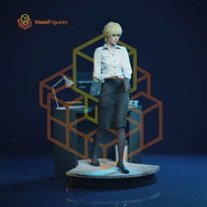May include: A collectible figurine of a blonde individual wearing a white button-down shirt, a dark grey knee-length skirt, black sheer tights, and black heels. The figure stands on a circular marble-patterned base with a desk and lamp behind.