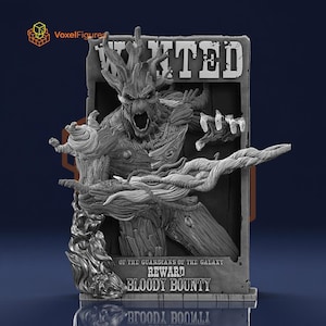 May include: A gray monochromatic 3D printed figure of a tree-like creature emerging from a rectangular frame. The frame features the text WANTED, OF THE GUARDIANS OF THE GALAXY, REWARD, and BLOODY BOUNTY. The figure has a textured bark-like surface.