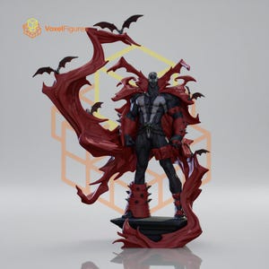 May include: A detailed figurine of a character in a black suit with white markings, wearing red spiked gauntlets and boots, and a large, flowing red cape that extends upward. Several small black bats are attached to the cape, and the figure stands on a dark base.