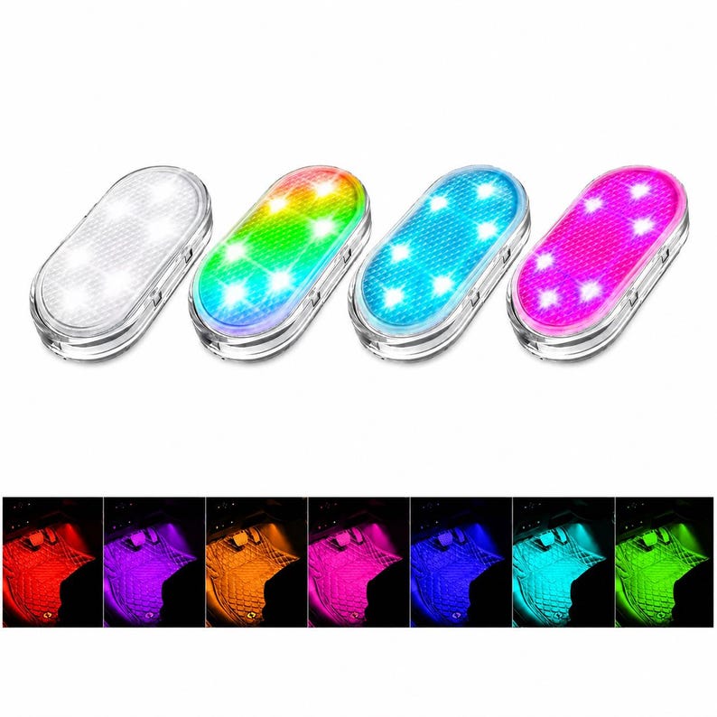 May include: Four oval-shaped LED lights with textured surfaces, each emitting a different color: white, a multi-color gradient, blue, and pink. Below, seven smaller square panels display the lights illuminating a car floor mat in red, purple, orange, pink, blue, cyan, and green.