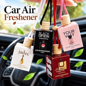May include: Four square glass car air freshener bottles with wooden caps and hanging cords. The bottles feature labels with the text jadec, BLACK OPTION, YOUR WAY, and Range 520. Each bottle contains 8ml of liquid and displays product branding.