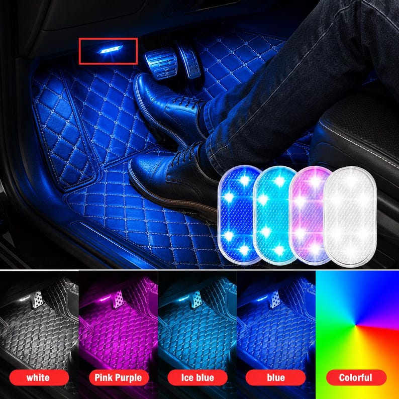 May include: An oval-shaped LED car interior light with a textured surface, shown in white, blue, pink, and ice blue. The light is installed in a vehicle footwell with blue diamond-stitched floor mats and metal pedals, illuminating the car floor.