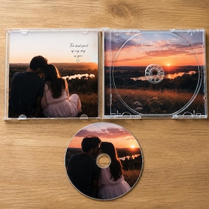 May include: A clear plastic CD jewel case containing a printed insert and a matching disc. The insert features a sunset landscape with a couple and the text "The best part of my day is you". The disc displays the same couple in a sunset scene.