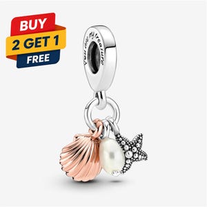 May include: A silver charm featuring a bail engraved with the text "you are my treasure" and three dangling pendants: a rose gold-toned seashell, a white freshwater pearl, and a textured silver starfish with small raised bead details.