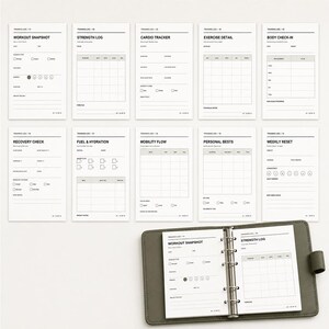 May include: A set of ten white paper training log inserts with black text and grid layouts, including sections for workout snapshots, strength logs, cardio trackers, and body check-ins, alongside a gray six-ring binder holding two of the pages.