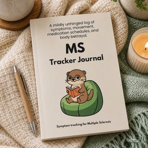 May include: A cream-colored MS Tracker Journal with a cartoon otter sitting in a green beanbag chair reading an orange book. The cover text reads: A mildly unhinged log of symptoms, movement, medication schedules, and body betrayal. MS Tracker Journal.
