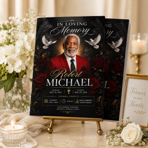 Può includere: Un programma funebre con il ritratto di un uomo anziano in abito rosso, circondato da rose rosso scuro e colombe bianche. Il testo riporta In Loving Memory, Robert Michael, Sunrise 15 maggio 1945, Sunset 25 maggio 2024, e i dettagli del servizio.