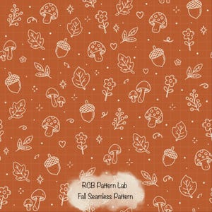 May include: A seamless pattern on a burnt orange background featuring a white grid and white line art illustrations of mushrooms, acorns, oak leaves, flowers, berries, hearts, and stars. The text RCB Pattern Lab Fall Seamless Pattern is visible.