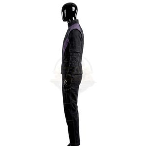 May include: A black costume set featuring a high-neck jacket with purple shoulder accents and a geometric quilted pattern on the sleeves. The matching black trousers include visible white stitching details along the legs and a structured silhouette.