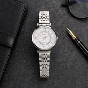 Womens Mother Of Pearl Watch 27mm Silver Tone Bling Faux Pearl Band New Battery Womens Mother Of Pearl Watch 27mm Silver Tone Bling Faux  main image 4