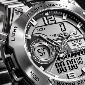 May include: A silver-toned analog-digital sport watch with a metallic link band. The watch face features the text LIGE, SPORT WATCH, WATER RESIST, DATE, CHRONO, and ALARM. It includes both physical hour and minute hands and a digital display screen.