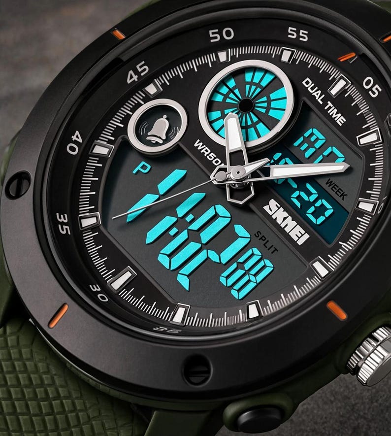May include: A black and olive green analog-digital watch featuring a round bezel with orange accents, a black dial with luminous blue digital displays, white hands, a bell icon, and the text SKMEI, DUAL TIME, WR50M, and SPLIT on the face.