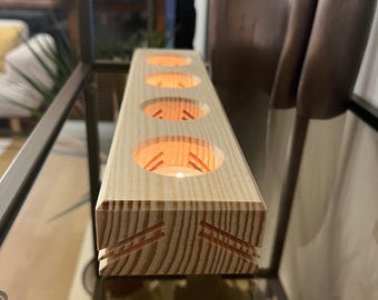 Wooden candle holder with light channel