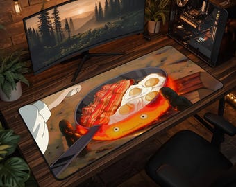 Peut inclure: Un tapis de bureau rectangulaire présentant une illustration graphique d'une poêle contenant du bacon et des œufs sur un esprit de feu orange brillant. Le design inclut une main tendant vers la poêle, sur un fond sombre aux tons chauds.