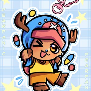 May include: A sticker featuring a cartoon reindeer character wearing a blue hat with a white cross, a yellow shirt, and brown shorts. The character is winking, surrounded by colorful pills and yellow stars, with a pink flower-shaped keychain above.
