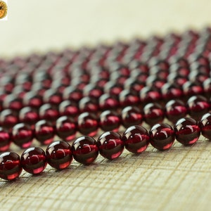 Grade,15 inch full strand Grade AA red Garnet smooth round beads 4mm