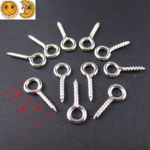 Puede incluir: Diez ganchos de ojal de tornillo de plata con un anillo de 7 mm de di&aacute;metro. Los ganchos miden aproximadamente 1,2 cm de largo.