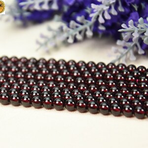Garnet,15 inch full strand Grade AA red Garnet smooth round beads 6mm
