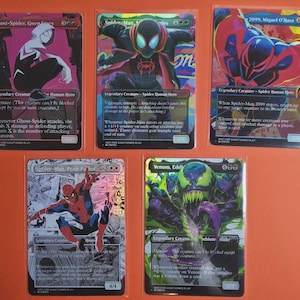 May include: Five rectangular trading cards featuring comic book characters including Ghost-Spider, Spider-Man Miles Morales, Spider-Man 2099, Peter Parker, and Venom. Each card displays colorful character illustrations, game text, and power stats.