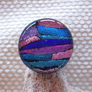 Sterling silver ring with dichroic glass blue and pink cabochon